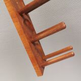 Beautiful Danish wine rack/holder for 3 bottles of wine on the wall. 1980s