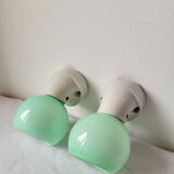 Duo of wall lamps in porcelain and green opaline