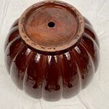 Complete in brown-toned enamelled ceramic, planter on its column