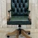 English chesterfield office armchair in green leather from the 1980s