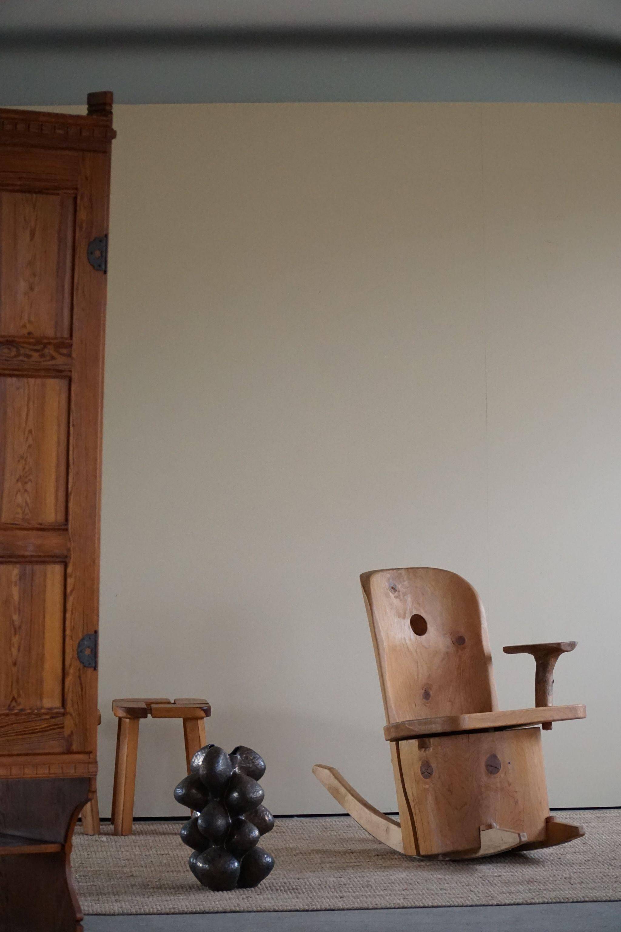 Unique sculptural rocking chair by the Finnish Matti Martikka in solid pine, 1960s.
