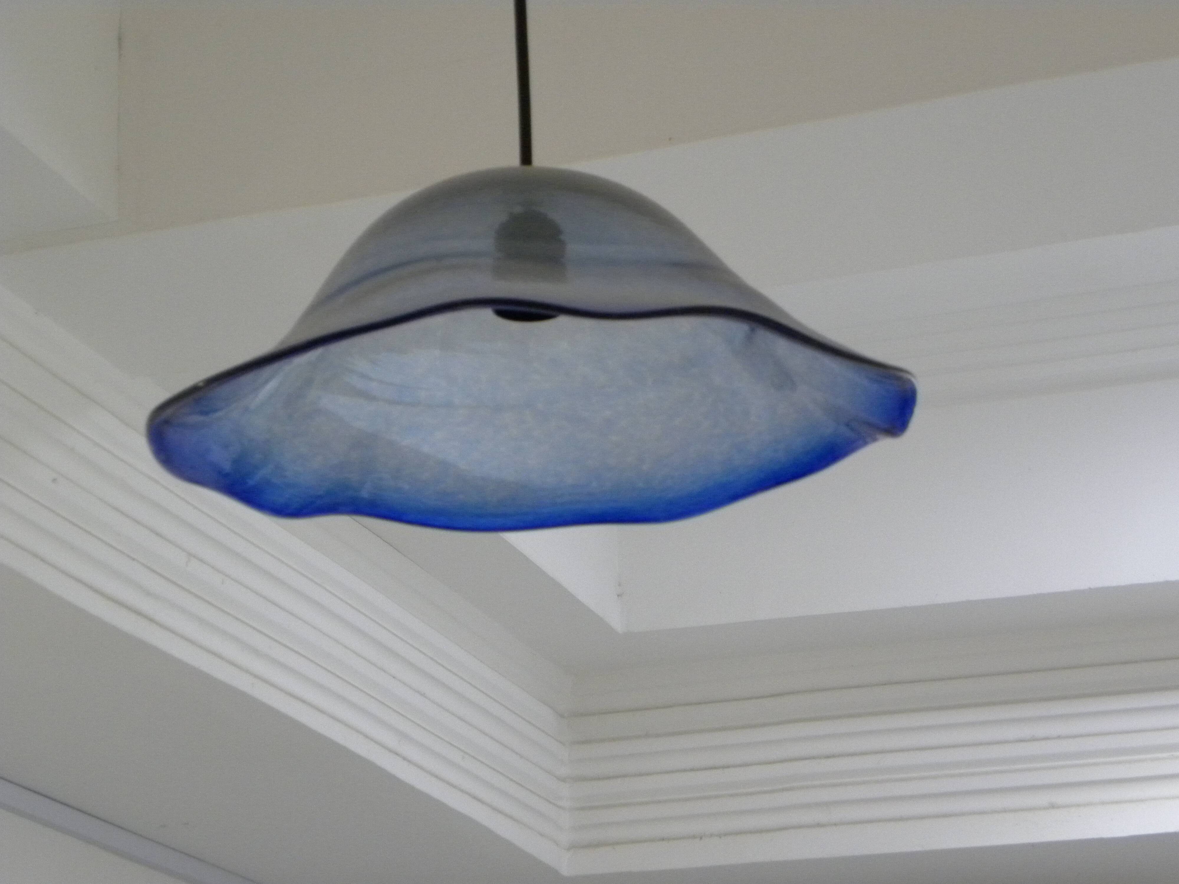 Frosted blue blown glass suspension light in 70s retro style.