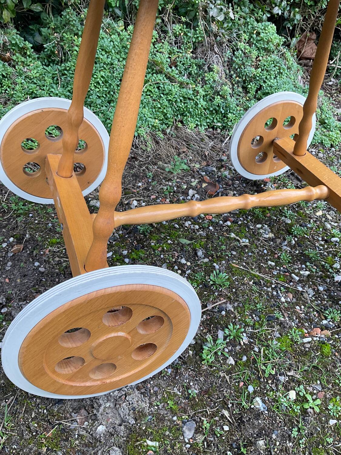 Vintage wicker cradle on casters