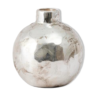 silver-coloured "bauble" cement vase