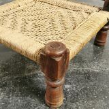 Ancient ethnic chair made of solid wood and rope