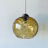 Amber glass ball suspension