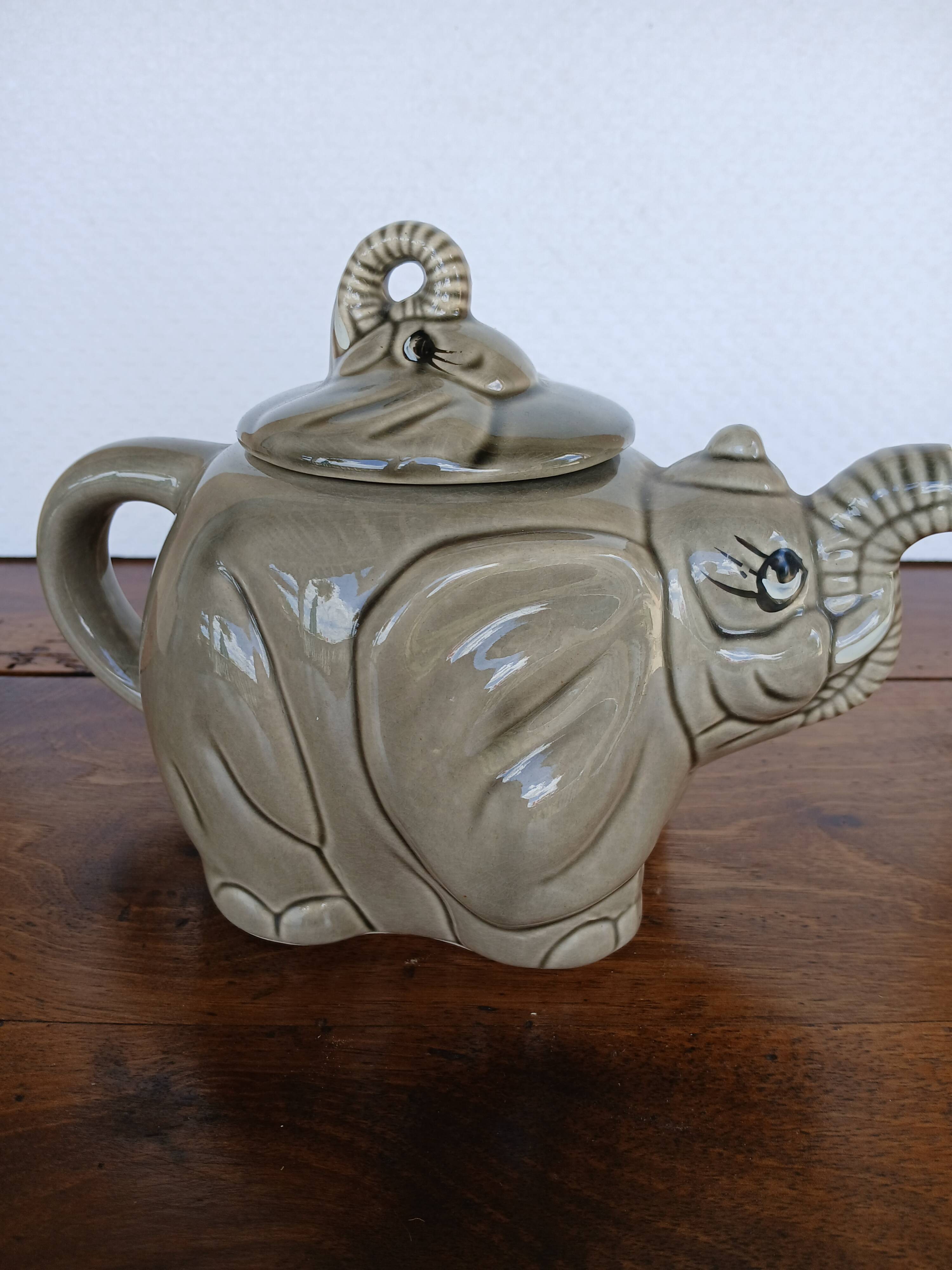 vintage ceramic teapot in the shape of a grey elephant