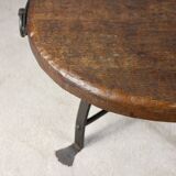 Brutalist round table in wrought iron and wood