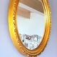 Round golden mirror, 1970.