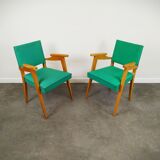 Pair of wood and vinyl armchairs