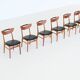 Set of six Danish dining chairs in teak and faux leather Denmark 1960