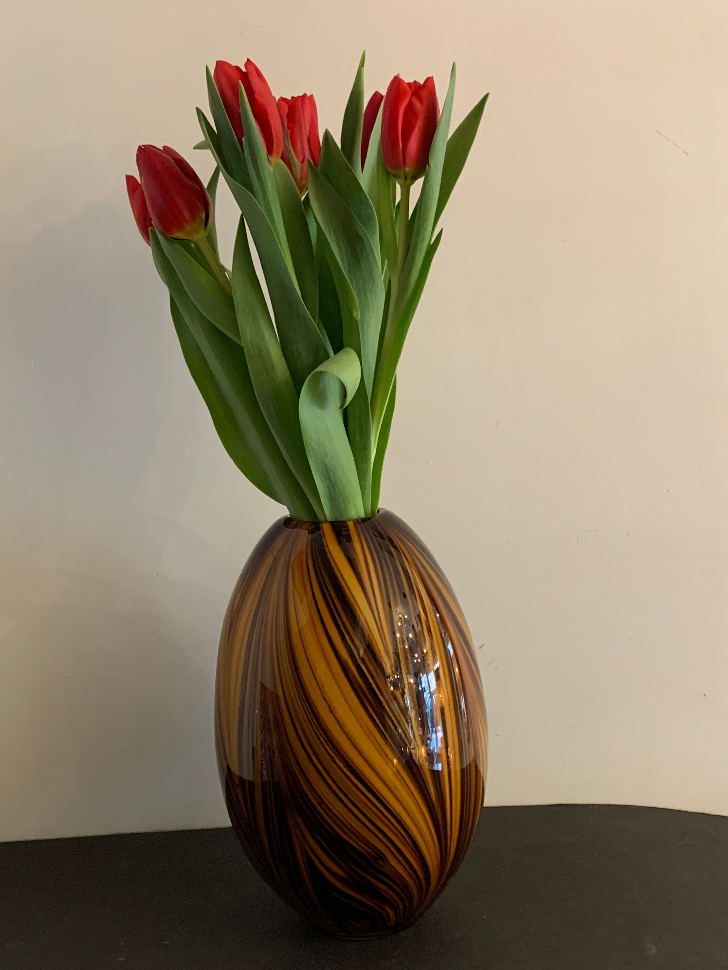 Yellow and black glass vase