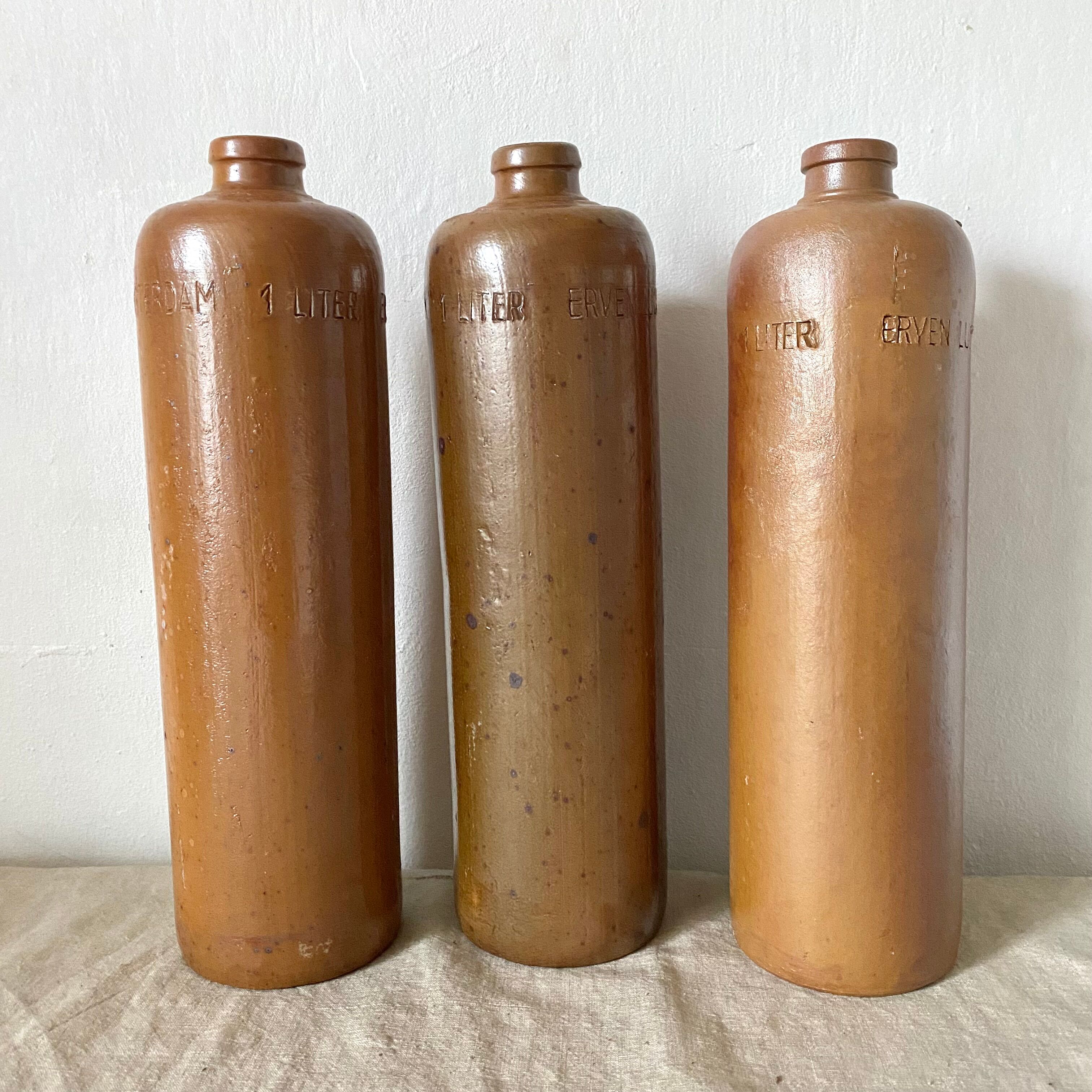 Antique stoneware bottles Erven Lucas Bols Het Lootsje Amsterdam