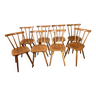 Lot de 8 chaises vintage en hêtre lasuré pieds compas et dossiers à barreaux