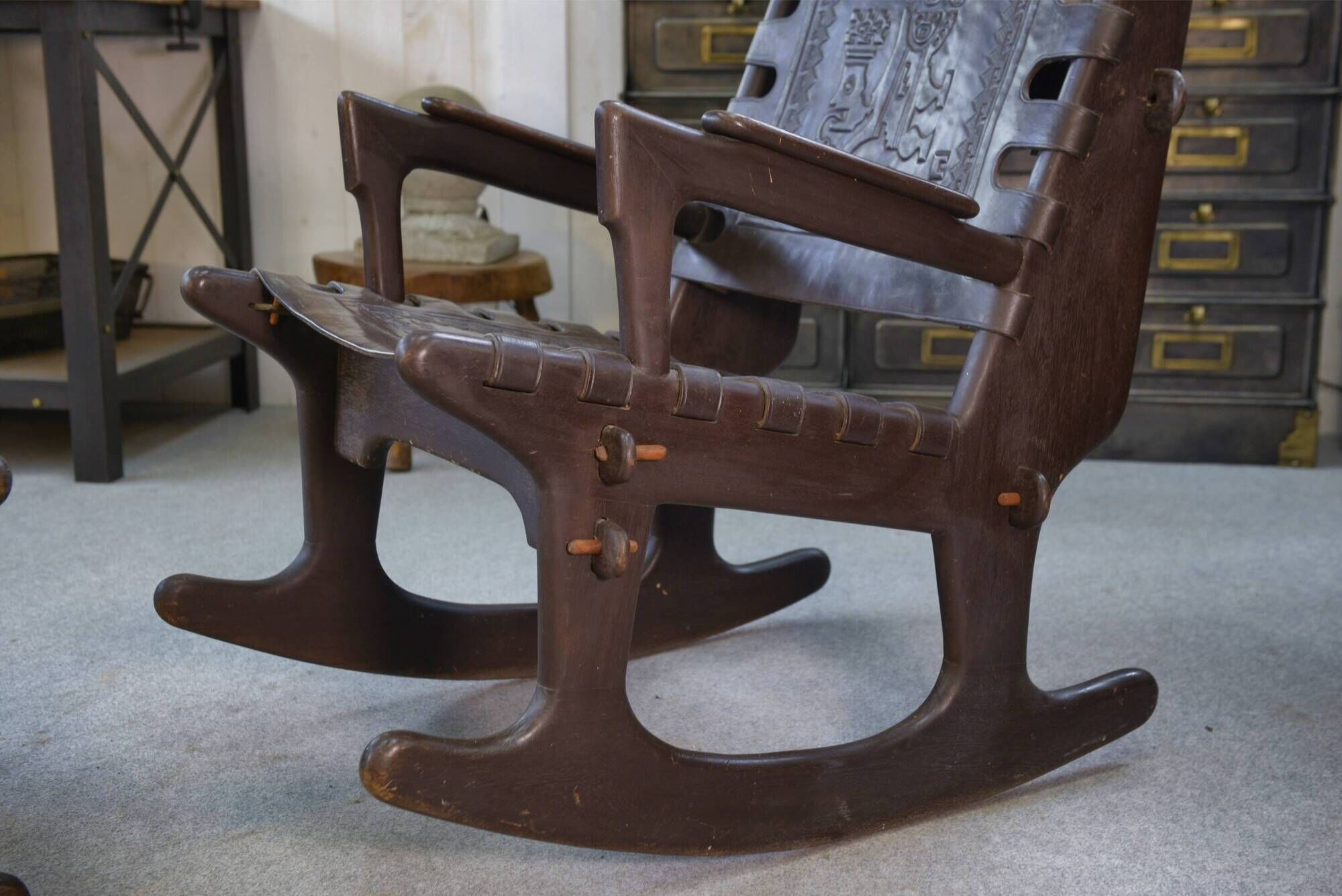 Armchair with ottoman by Angel Pazmino in brown wood and leather from the 1960s.