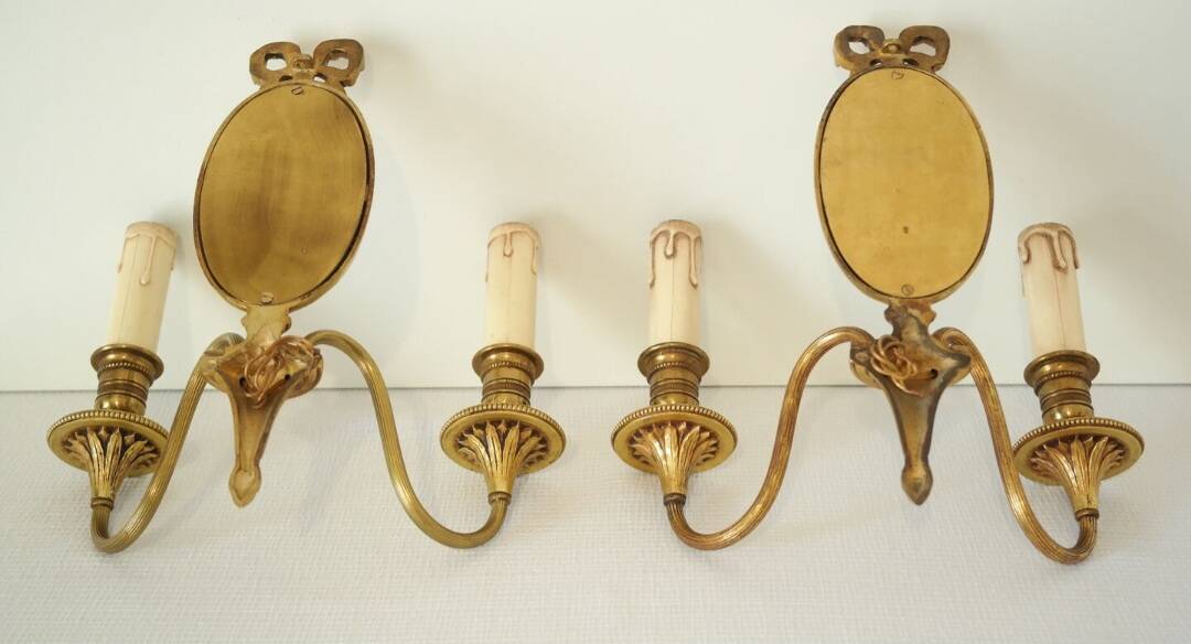 Paire d'appliques en bronze style Louis XVI Lucien Gau