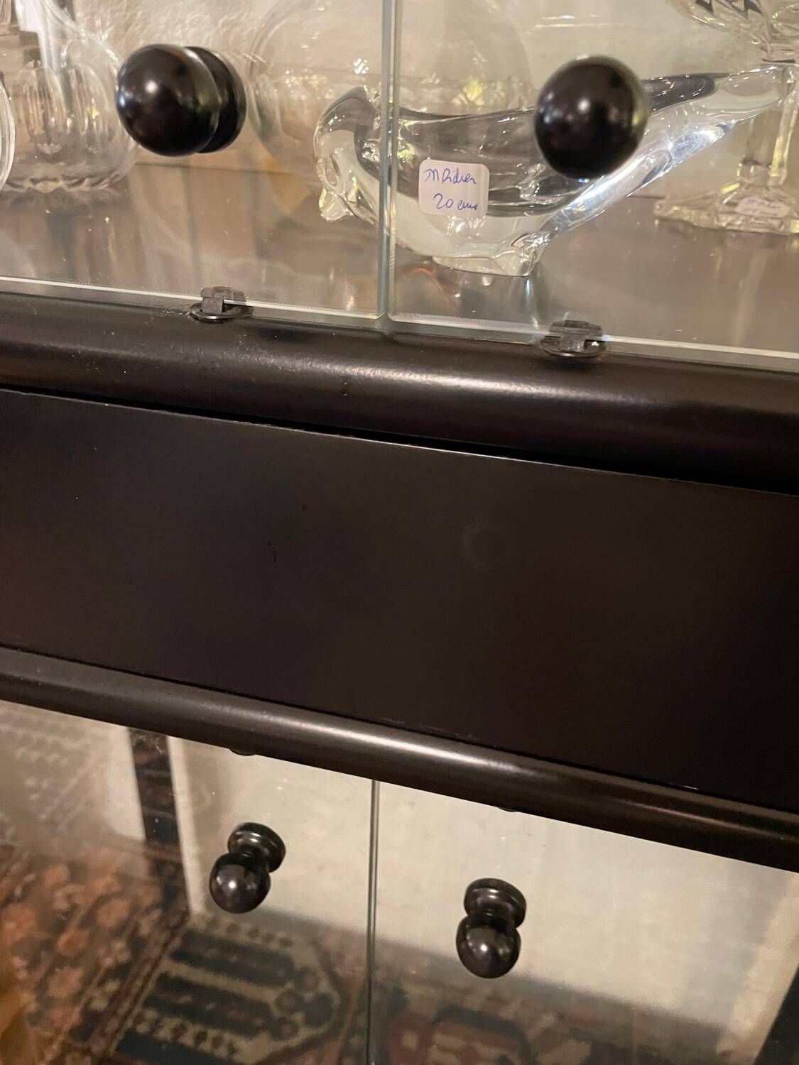 2 display cabinets signed by Baumann