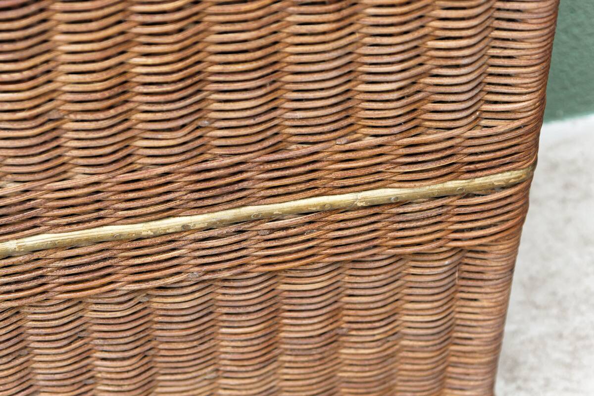 Woven wicker laundry basket