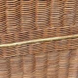 Woven wicker laundry basket
