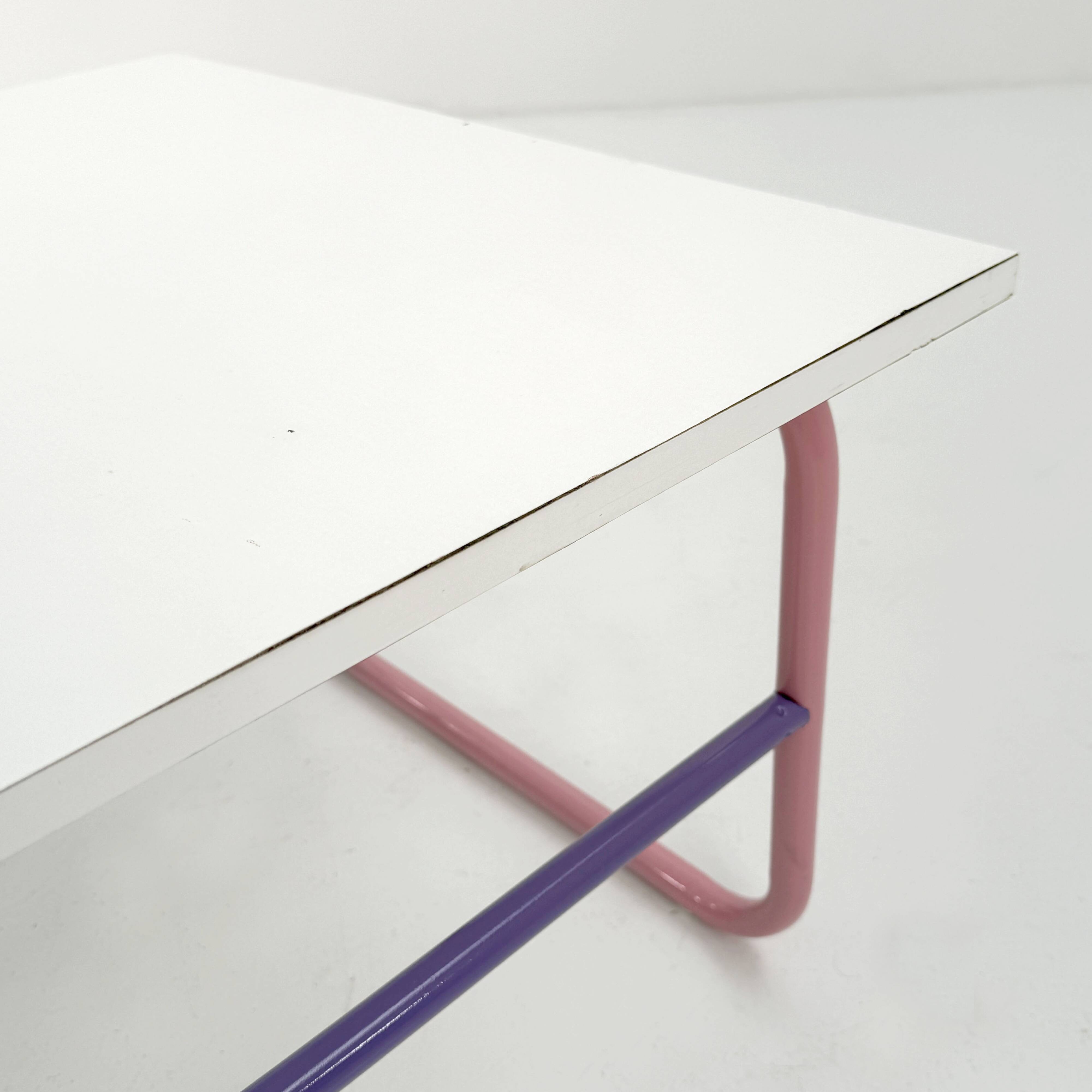 Pink and mauve tubular coffee table, 1980