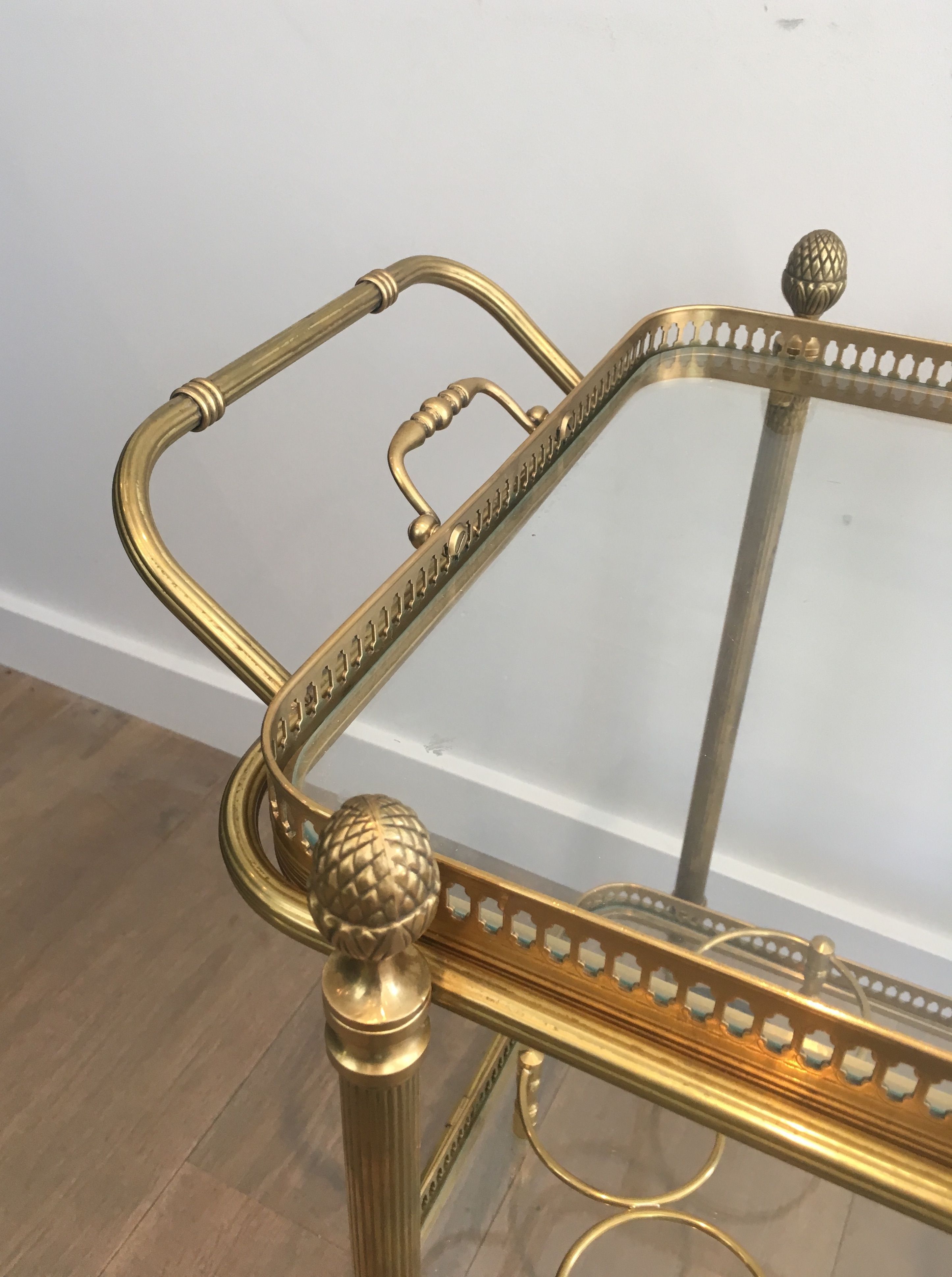 Neoclassical brass rolling table from Maison Baguès