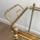 Neoclassical brass rolling table from Maison Baguès
