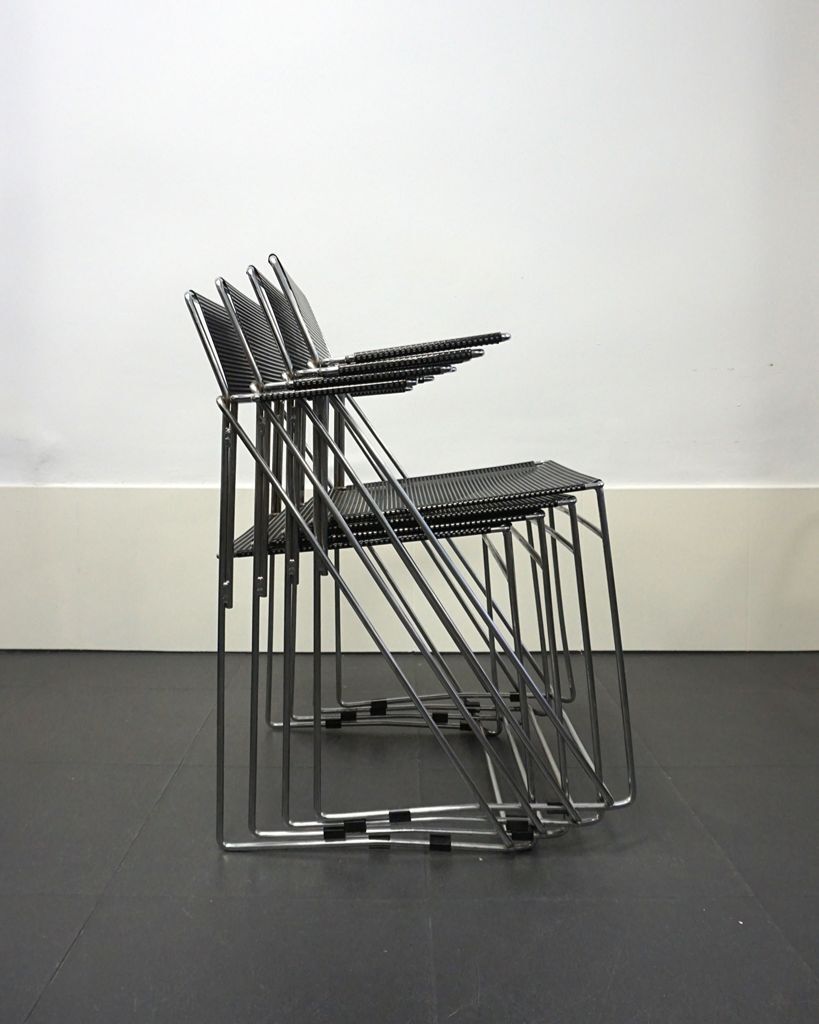 4 X line chairs with armrests designed by Niels Jørgen Haugesen