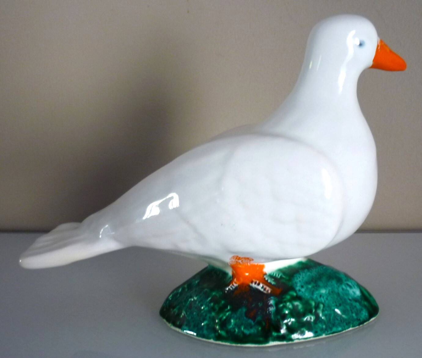 Glazed ceramic bird, signed Vallauris with bright colors