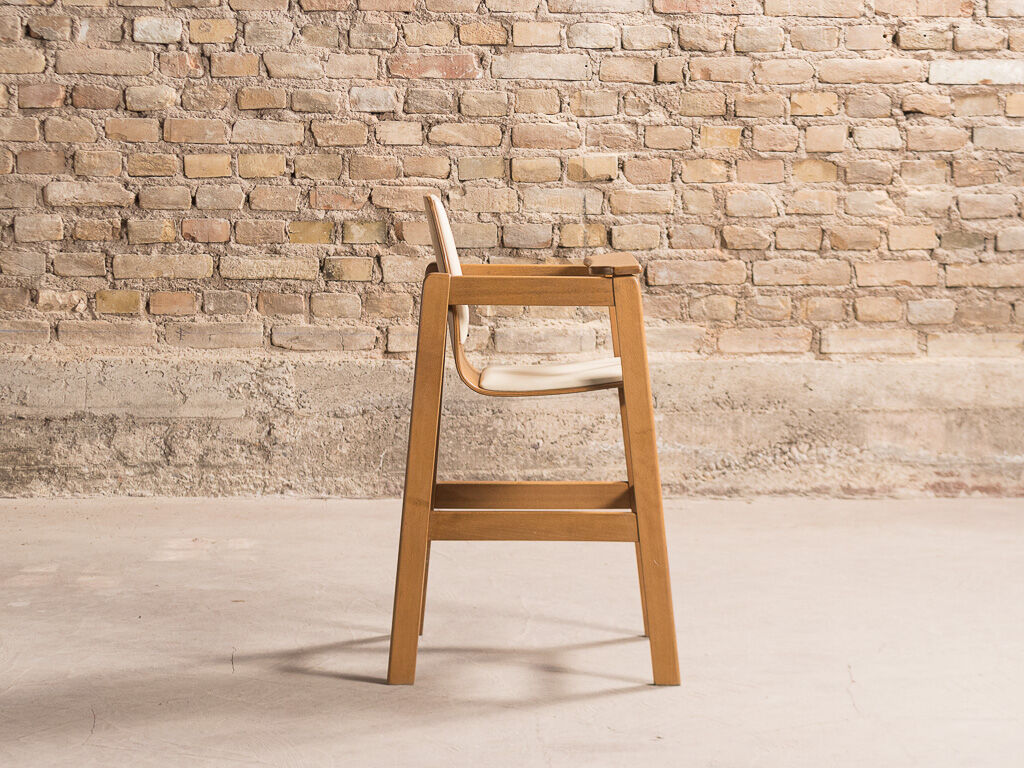 Children's high chair in solid tinted beech, seat and back in imitation cream leather, certification