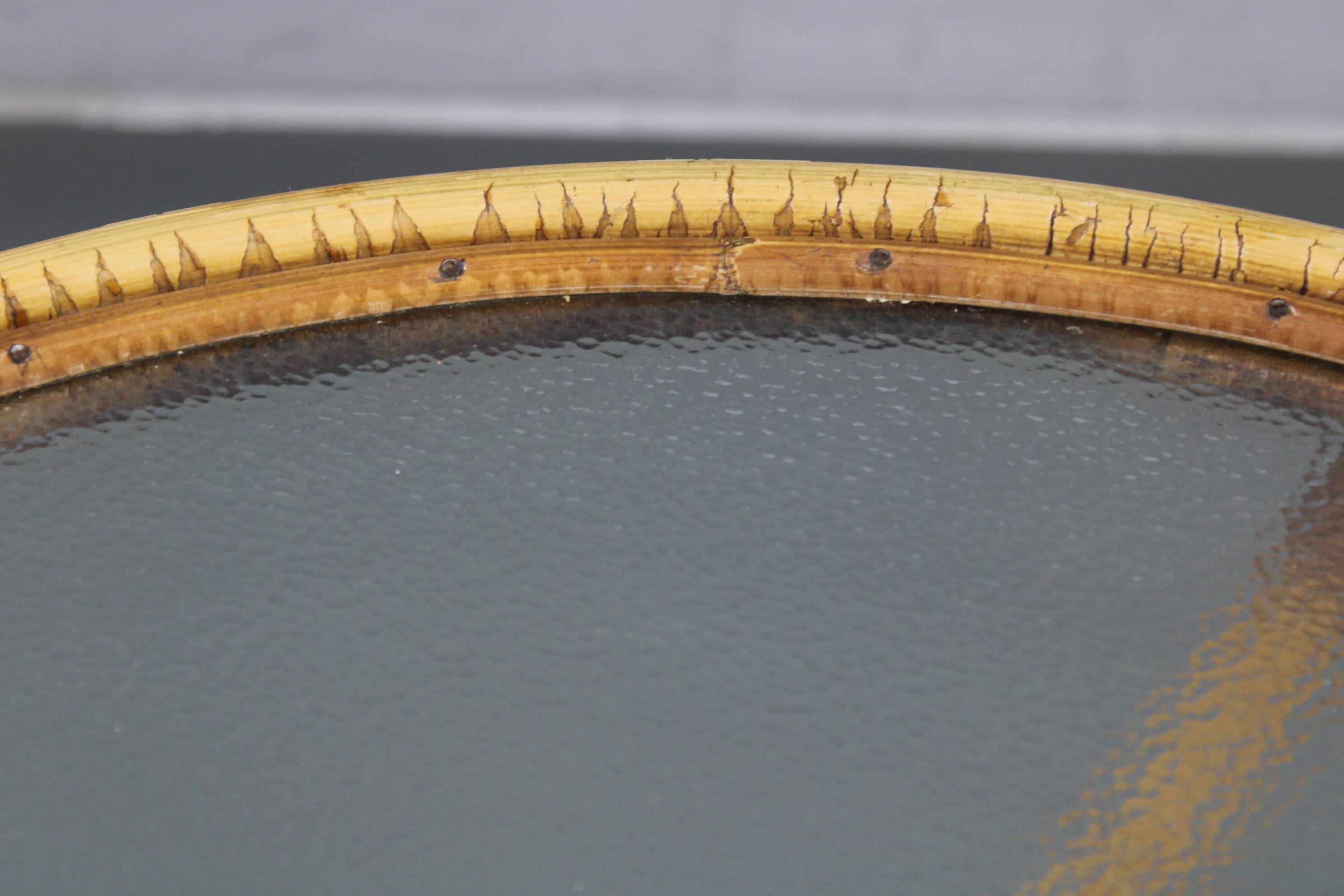 1960s Italian rattan coffee table with glass top, mid-century round design
