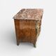 Louis XV period commode with violet wood veneer.