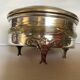 Antique silver-plated tripod box in the Louis XVI style.
