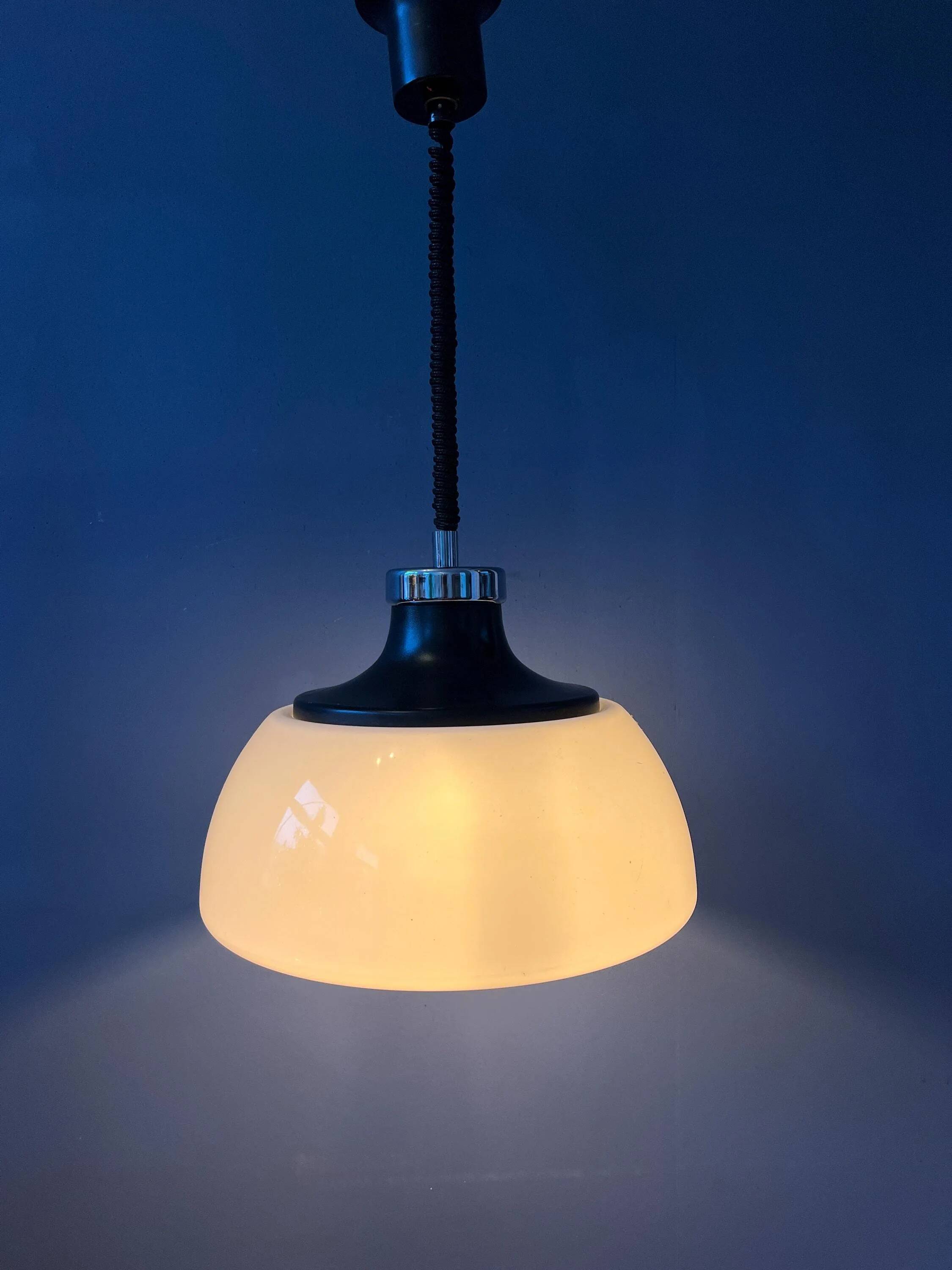 Massive Space Age Mid-Century suspension in plexiglass with white acrylic shade.