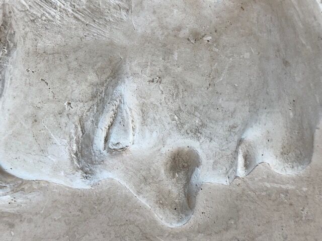 Bust of a man to hang