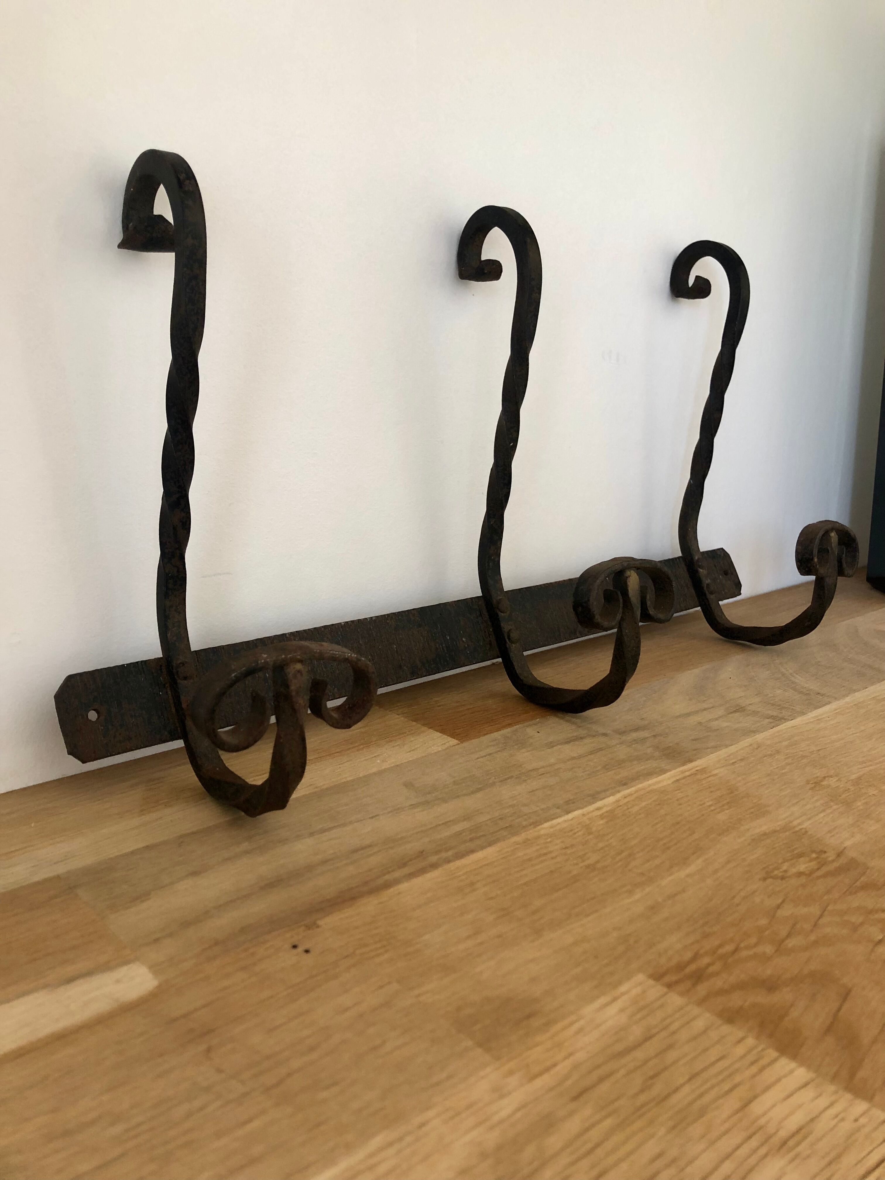 Old wrought iron coat hook/coat rack