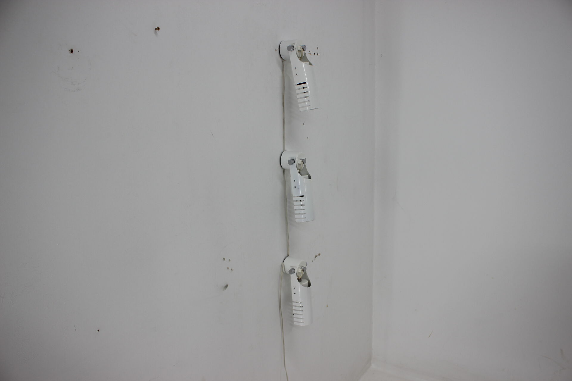 Set of three white adjustable design wall lamp, 1980's.