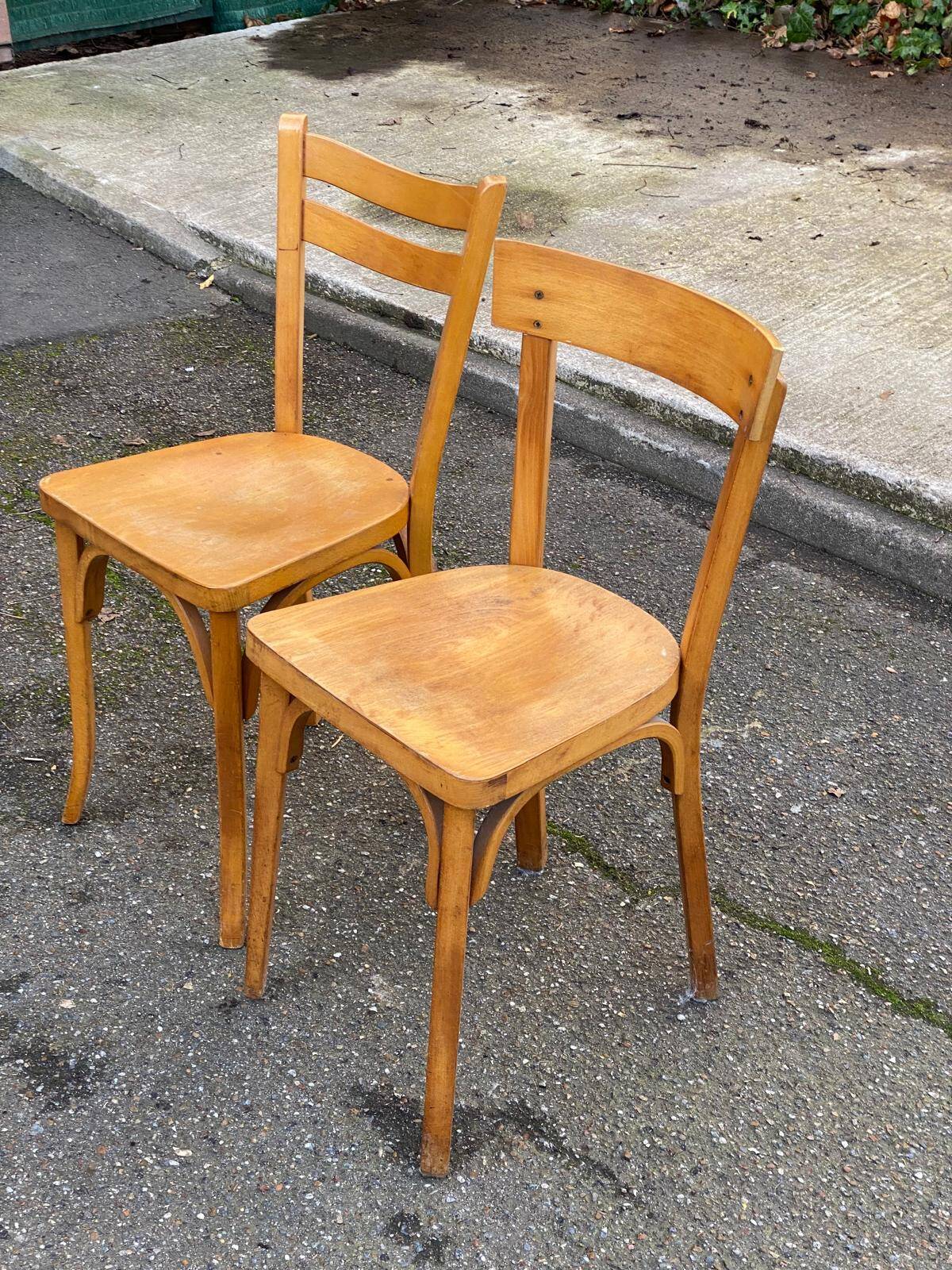 2 Scandinavian bistro chairs by Baumann in light wood from 1980.
