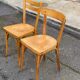 2 Scandinavian bistro chairs by Baumann in light wood from 1980.