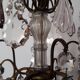 Louis XV-style bronze cage and crystal Baccarat chandelier