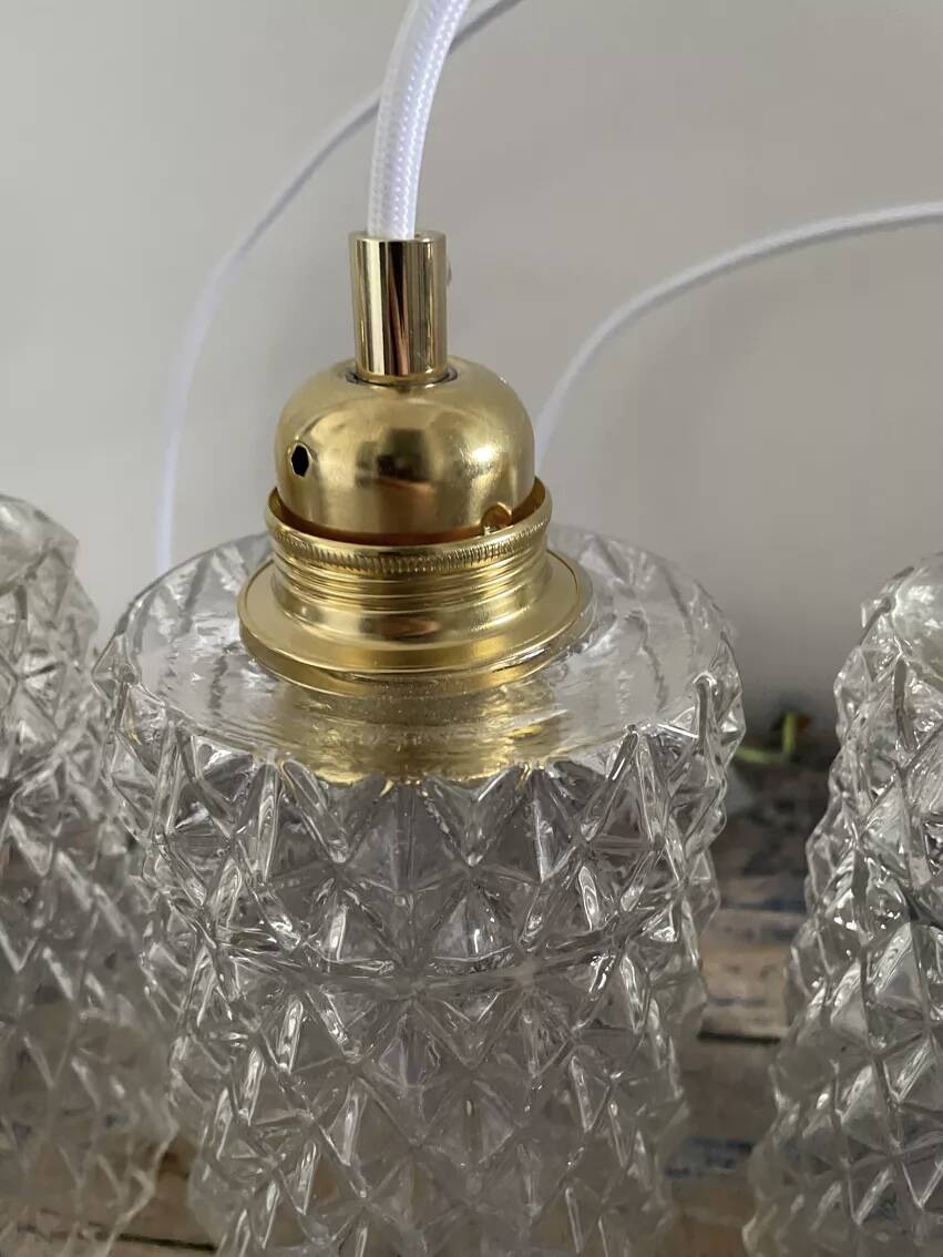Set of three chiseled glass pendant lights of Scandinavian origin