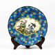 Assiette Longwy début XXe  – Émaux cloisonnés à décor d’oiseaux et fleurs