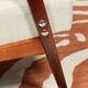 Vintage light gray armchair dark wood Scandinavian design 1970