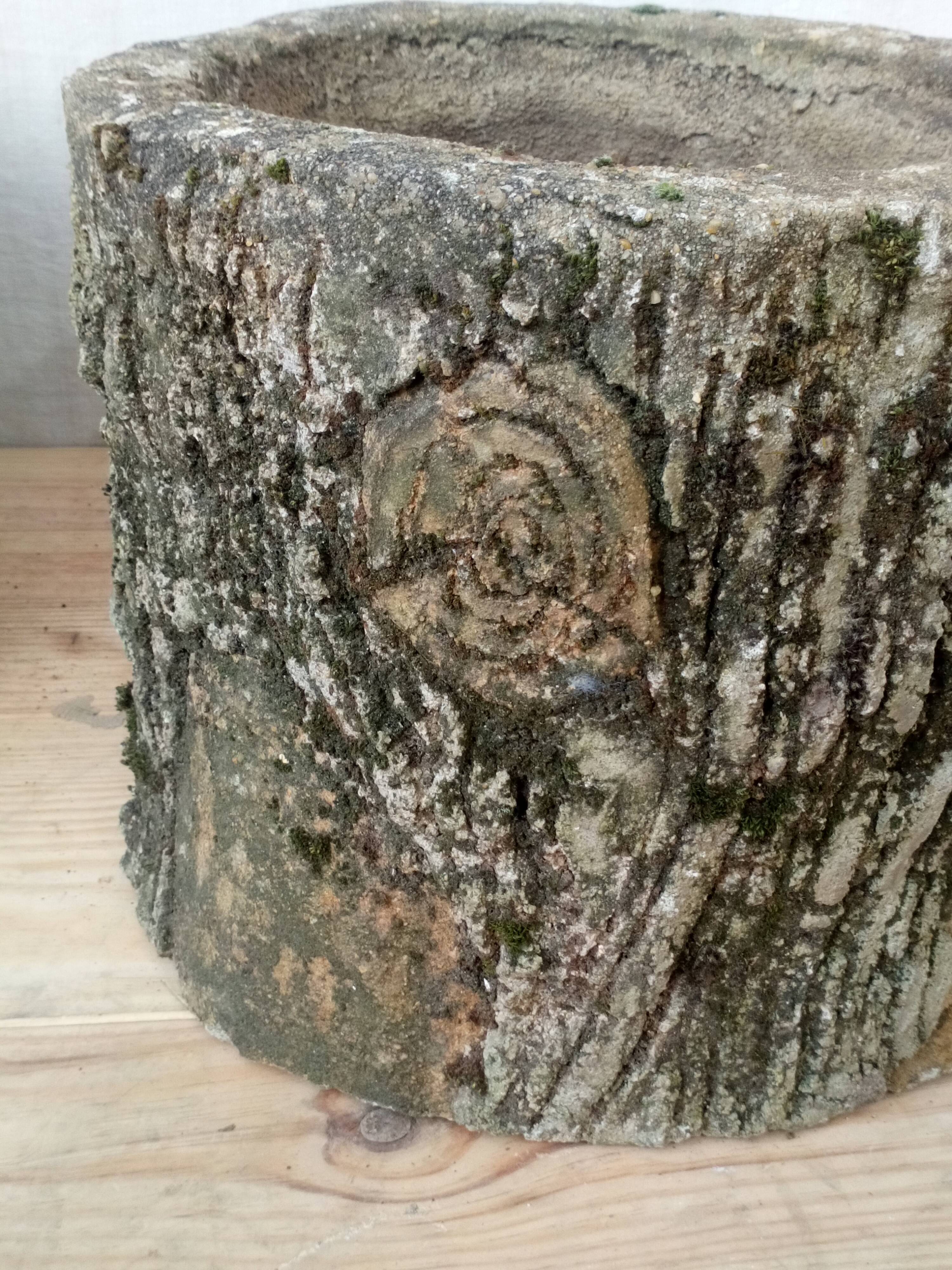 Pair of old rock garden planters in concrete