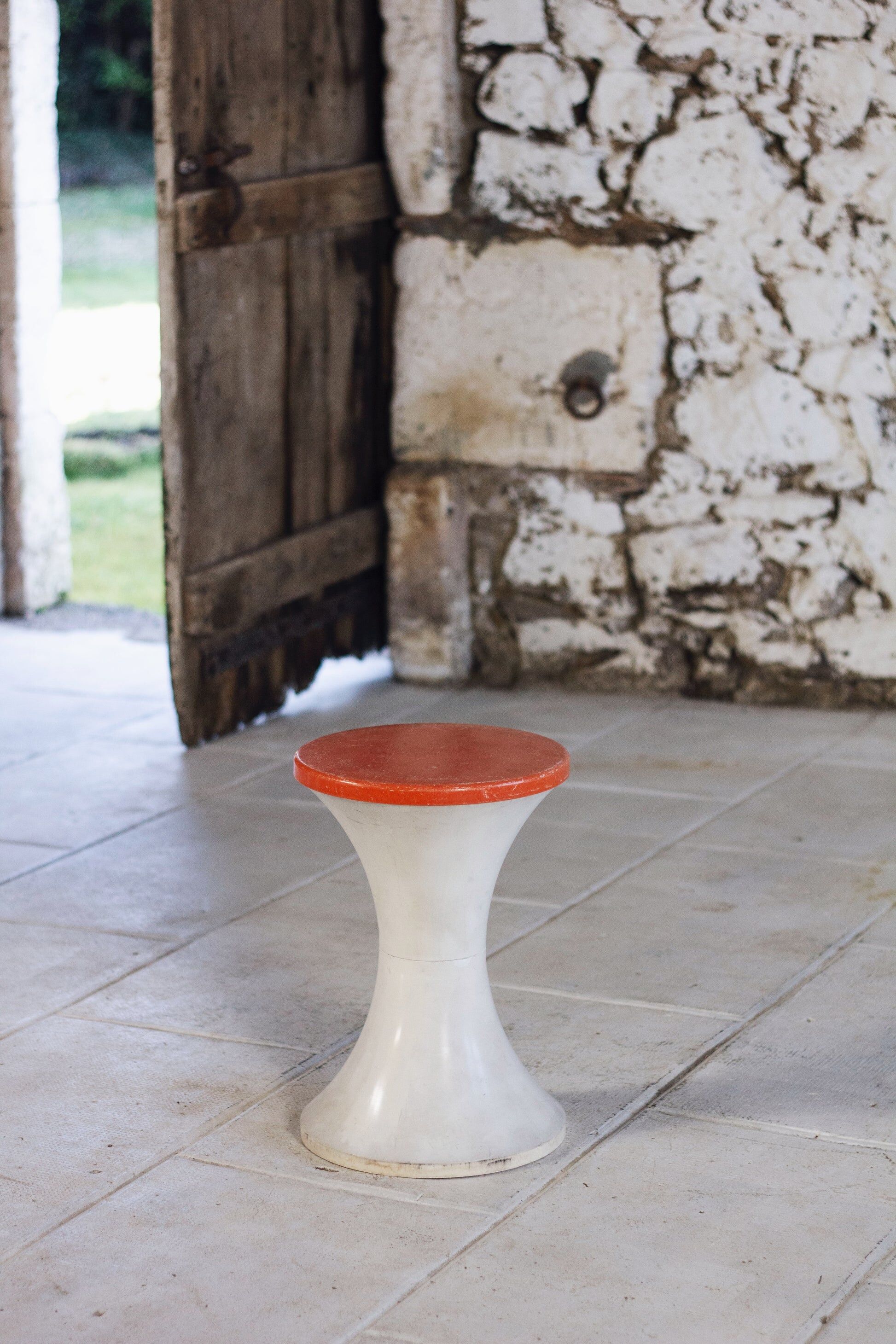 White and dark orange Tam Tam stool by Henry Massonnet for Stamp, 1970.