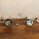 Duo of brass and glass wall lamps
