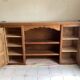 Upper part of a rustic solid oak dresser with its cornice.