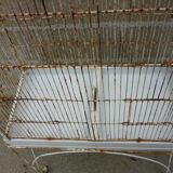 Bird cage with its wheeled holder