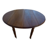Antique round table with shutters in walnut wood on casters