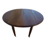 Table ronde ancienne à volets en bois noyer à roulettes