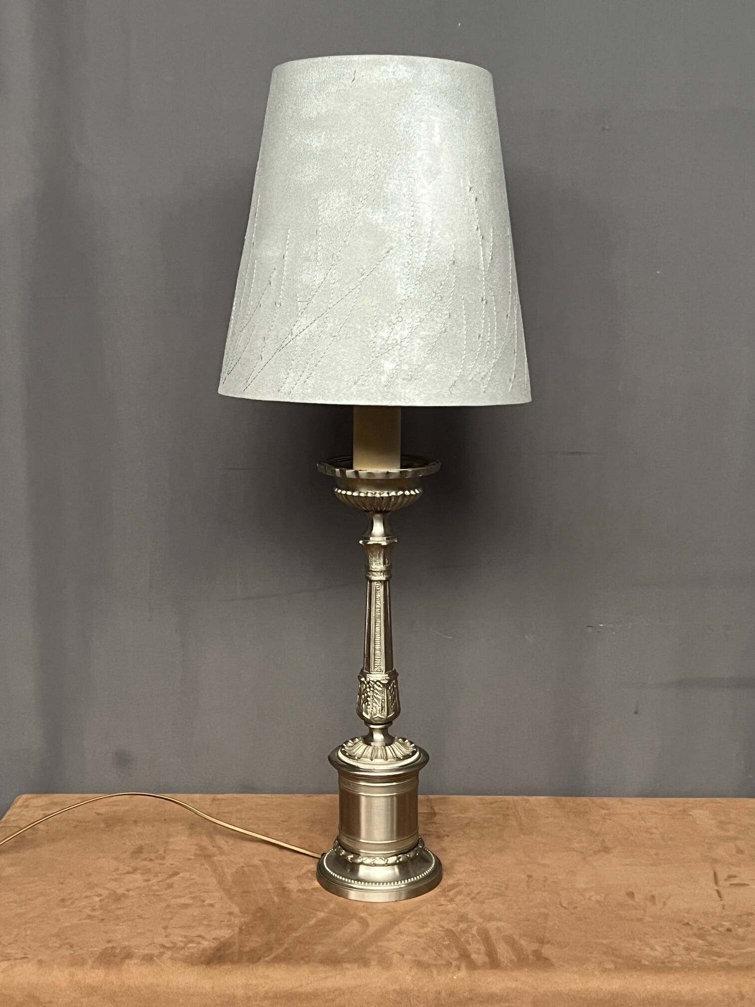 Table lamp. Solid silvered metal.